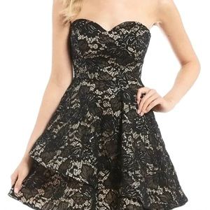 B. Darlin strapless black lace formal dress